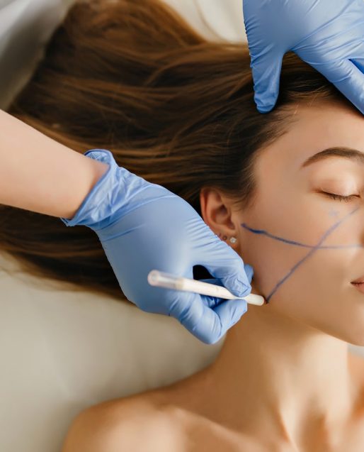 closeup-portrait-beautiful-woman-cosmetology-procedures-rejuvenation-beauty-salon-dermatology-procedure-painting-eyebrows-hands-blue-glows-work-healthcare-botox-min